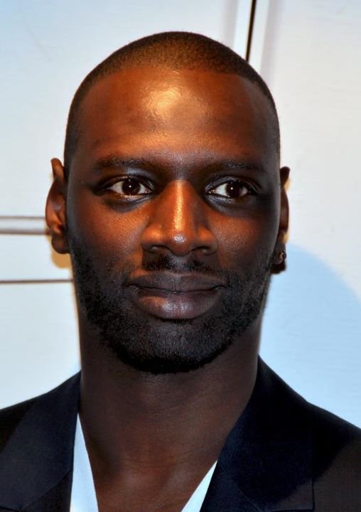Omar Sy na cerimônia dos Prix Lumières, em 2012; fotografia de arquivo, não é cena de Lupin.